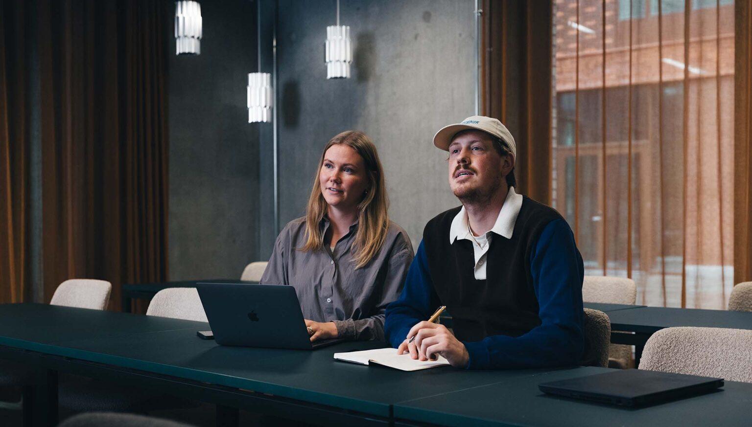Coworkers listening to a presentation